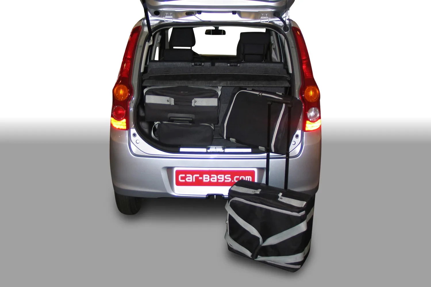 Set maletas especifico DAIHATSU Cuore (L276) 2007- 5d CAR-BAGS (2x Trolley + 2x Bolsa de mano)